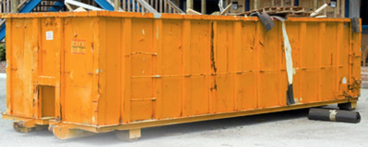 Large yellow commercial skip